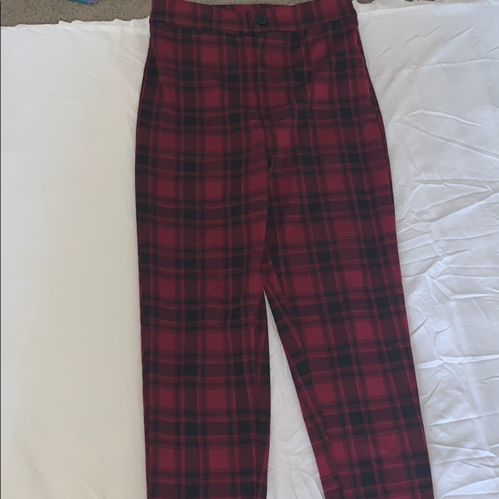 red and black formed fitting plaid pants